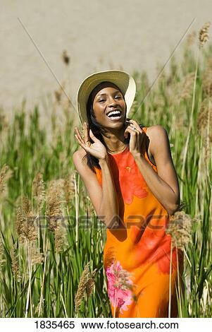 Stock Photography - Woman in hat. Fotosearch
