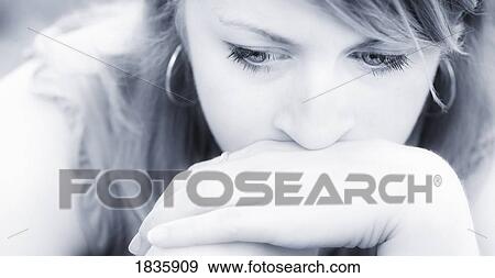 Stock Photo - Woman in thought. Fotosearch