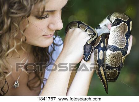 Woman with a snake View Large Photo Image Stock Photo - Woman with a snake. Fotosearch