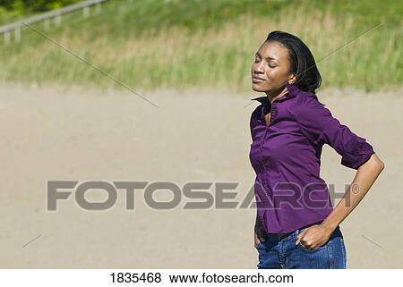 Woman with eyes closed View Large Photo Image Stock Photo - Woman with eyes closed. Fotosearch