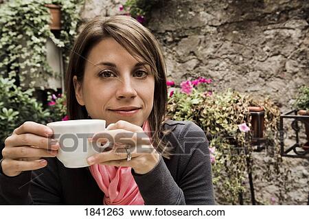 Woman with porcelain cup View Large Photo Image Stock Image - Woman with porcelain cup. Fotosearch