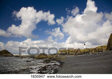 Stock Photo - Yaquina Head Lighthouse, Oregon Coast, Oregon, USA; Lighthouse built in the 19th Century. Fotosearch