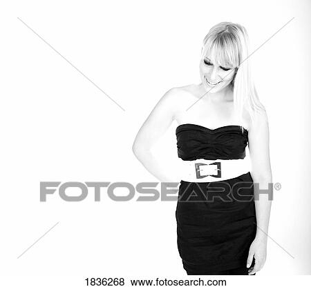 Stock Photo - Young woman in formal dress. Fotosearch