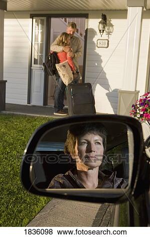 Young woman visiting dad with mom looking on View Large Photo Image Stock Photo - Young woman visiting dad with mom looking on. Fotosearch