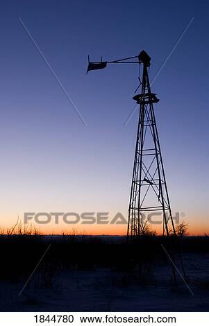 Alberta, Canada; Old wind mill at sunset View Large Photo Image Stock Image - Alberta, Canada; Old wind mill at sunset. Fotosearch