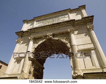 Stock Image - Arch of Titus, Rome, Italy; Triumphal arch built by emperor Domitian shortly after the death of his older brother Titus commemorating the capture and sack of Jerusalem in 70 . Fotosearch
