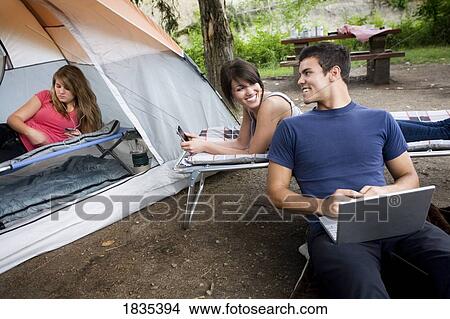 Picture - At a camp site. Fotosearch