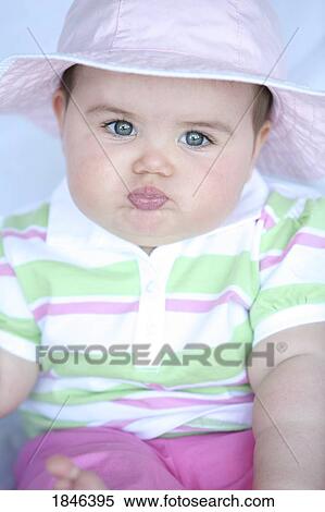 Baby girl wearing hat View Large Photo Image Stock Photography - Baby girl wearing hat. Fotosearch