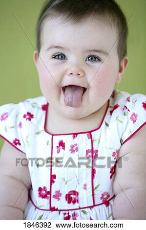 Baby girl with tongue out View Large Photo Image Stock Image - Baby girl with tongue out. Fotosearch