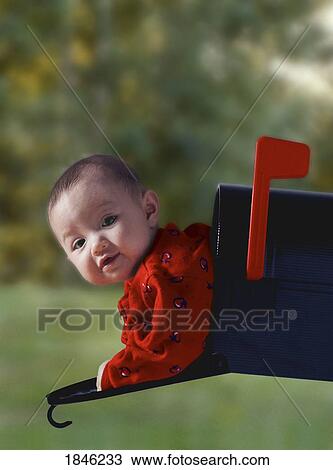 Stock Image - Baby in mailbox . Fotosearch