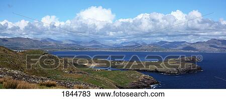 Stock Image - Ballinskelligs Bay, County Kerry, Ireland, Waterville in the background. Fotosearch