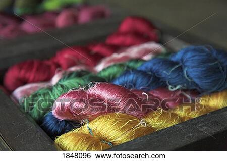 Ban Tha Sawang, Thailand, Asia; Colorful silk weaving View Large Photo Image Stock Photograph - Ban Tha Sawang, Thailand, Asia; Colorful silk weaving . Fotosearch