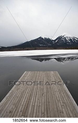 Banff, Alberta, Canada; Dock on a mountain lake View Large Photo Image Picture - Banff, Alberta, Canada; Dock on a mountain lake. Fotosearch