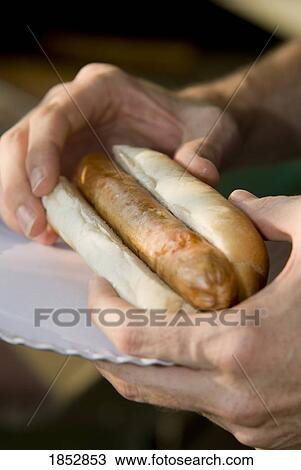 Barbeque; Sausage in a bun View Large Photo Image Stock Image - Barbeque; Sausage in a bun. Fotosearch