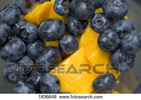 Stock Photo - Blueberries and peaches. Fotosearch