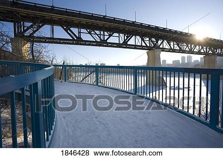 Bridge over the river in winter, Edmonton, Alberta, Canada View Large Photo Image Stock Photo - Bridge over the river in winter, Edmonton, Alberta, Canada. Fotosearch