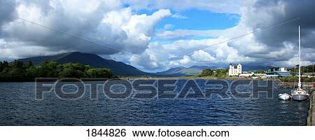 Stock Photograph - Cahirciveen, County Kerry, Ireland; At the harbour with the Barracks. Fotosearch