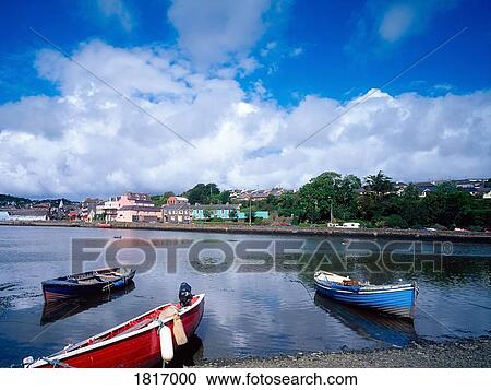 Stock Image - Canoes on water, Co Cork, Kinsale, Ireland. Fotosearch