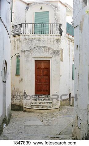 Capri, Italy; Red doorway and narrow street of Capri View Large Photo Image Stock Photo - Capri, Italy; Red doorway and narrow street of Capri. Fotosearch