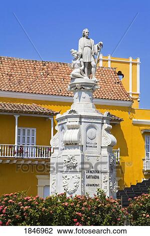 Stock Image - Cartagena City, Bolivar, Colombia, Central America; J. B. Maine Royt Historic Monument, Plaza de La Aduana, Old Walled City District . Fotosearch
