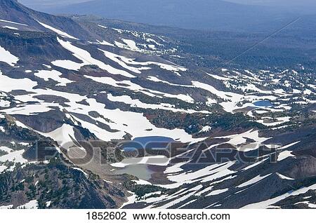 Stock Image - Chambers Lakes, Oregon Cascades, Oregon, USA; Aerial view of mountain lakes. Fotosearch
