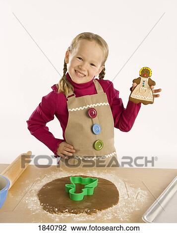 Stock Image - Child baking. Fotosearch