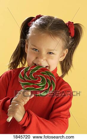 Child with a lollipop View Large Photo Image Stock Image - Child with a lollipop. Fotosearch