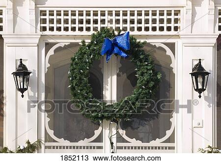 Stock Image - Christmas decorations on exterior of building, Waterloo, Quebec, Canada. Fotosearch