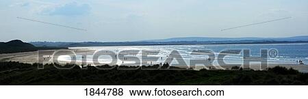 Co Sligo, Ireland; Enniscrone beach with Killala Village in background View Large Photo Image Stock Photo - Co Sligo, Ireland; Enniscrone beach with Killala Village in background. Fotosearch