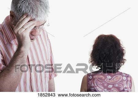 Stock Image - Couple; husband and wife fighting. Fotosearch