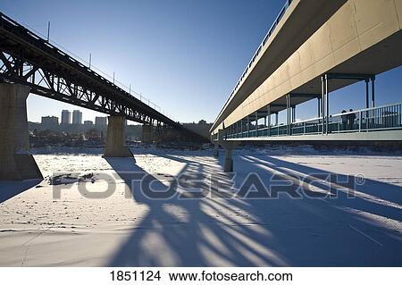 Couple walking over footbridge View Large Photo Image Picture - Couple walking over footbridge. Fotosearch