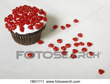 Cupcake with candy hearts View Large Photo Image Stock Image - Cupcake with candy hearts. Fotosearch