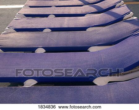 Deck chairs View Large Photo Image Stock Photograph - Deck chairs. Fotosearch