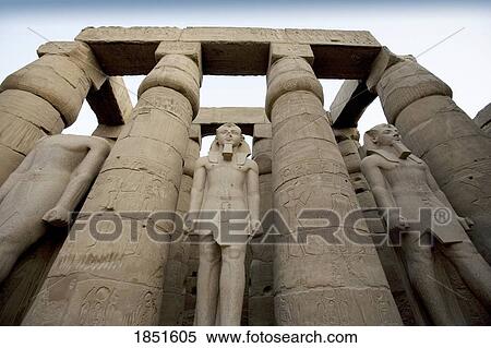 Stock Photography - East Bank of Luxor, Egypt; The Luxor Temple Ramses II statues . Fotosearch