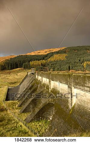 Stock Photo - Fall colors and dark sky, Argyll and Bute, Scotland. Fotosearch