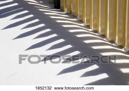 Fence shadows on the snow View Large Photo Image Stock Image - Fence shadows on the snow. Fotosearch