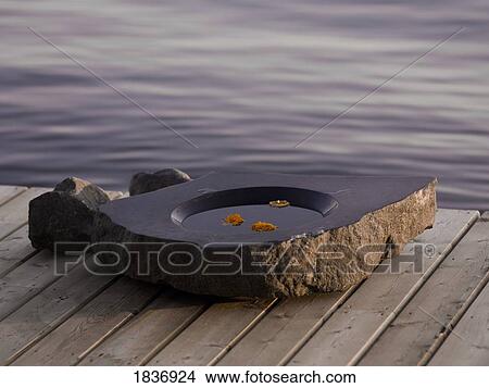 Picture - Floating candle holder. Fotosearch