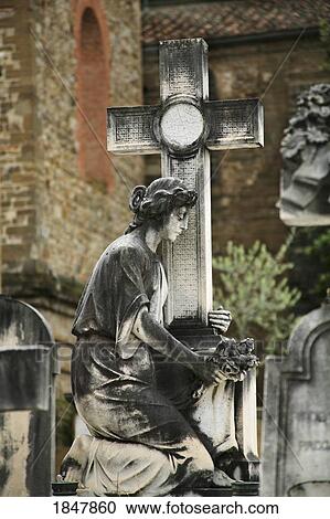 Florence, Italy; Statue of Women holding a cross View Large Photo Image Stock Image - Florence, Italy; Statue of Women holding a cross. Fotosearch