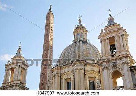 Fountain of the Four Rivers, Sant'Agnese in Agone, Rome, Italy; Obelisk designed by Gianlorenzo Bernini in front of a basilica View Large Photo Image Stock Photo - Fountain of the Four Rivers, Sant'Agnese in Agone, Rome, Italy; Obelisk designed by Gianlorenzo Bernini in front of a basilica. Fotosearch
