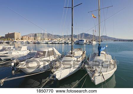 Stock Image - Fuengirola, Malaga Province, Costa del Sol, Spain; Pleasure crafts in harbour . Fotosearch