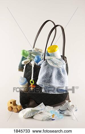 Stock Image - Full diaper bag. Fotosearch