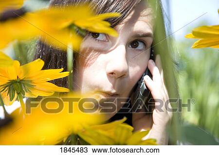 Girl on cell phone View Large Photo Image Stock Image - Girl on cell phone. Fotosearch