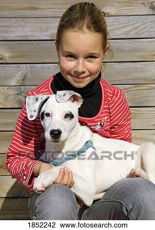 Girl with dog; Portrait of a girl with a dog View Large Photo Image Stock Image - Girl with dog; Portrait of a girl with a dog. Fotosearch