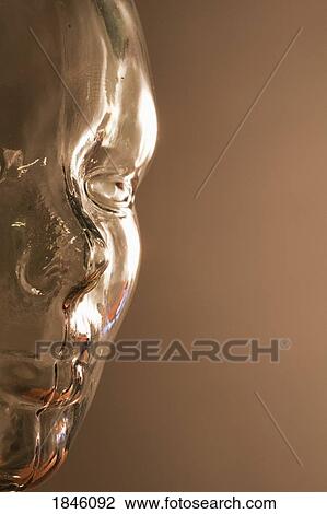 Stock Image - Glass image of a face. Fotosearch