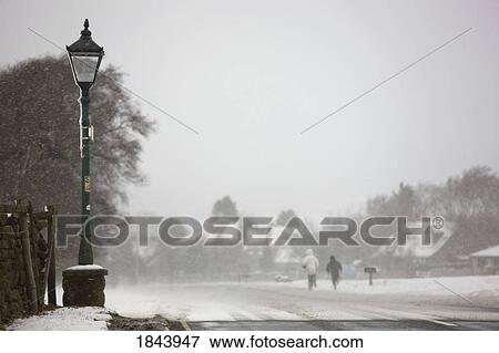 Stock Photo - Goathland, North Yorkshire, England; snowing. Fotosearch