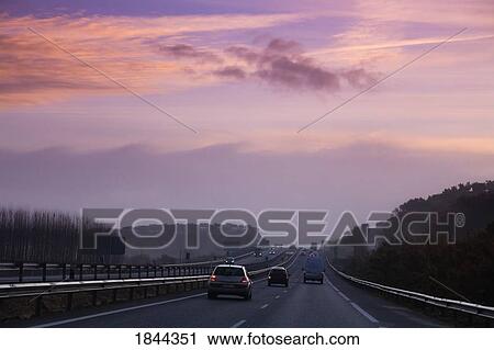 Granada, Spain; Sunrise over a highway View Large Photo Image Stock Image - Granada, Spain; Sunrise over a highway. Fotosearch