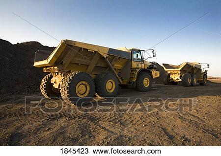 Stock Image - Hard at work. Fotosearch