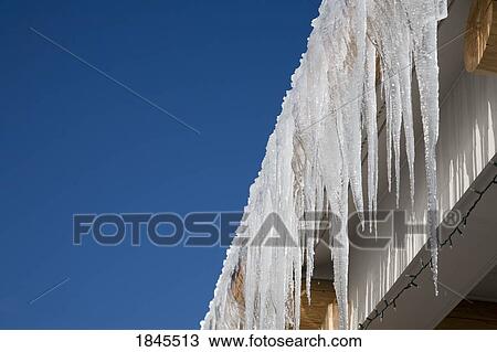 Icicles on a roof View Large Photo Image Stock Image - Icicles on a roof. Fotosearch