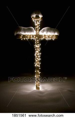 Stock Image - Illuminated cross. Fotosearch