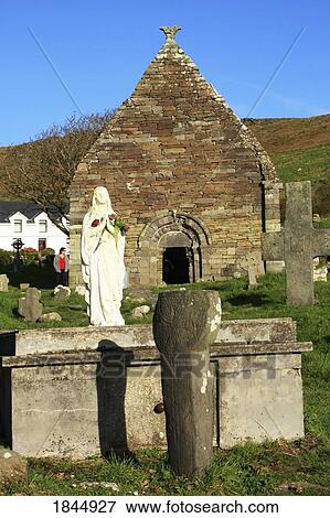 Kilmalkedar Church, Dingle Peninsula, County Kerry, Ireland; Virgin Mary in front of old stone church View Large Photo Image Stock Photo - Kilmalkedar Church, Dingle Peninsula, County Kerry, Ireland; Virgin Mary in front of old stone church. Fotosearch
